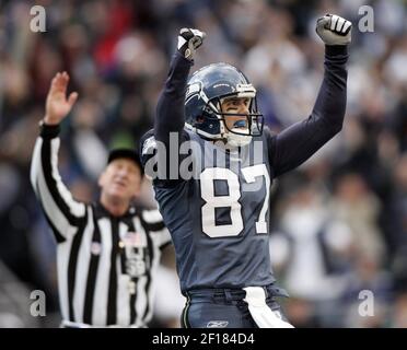 Seattle Seahawks wide receiver Joe Jurevicius celebrates a first