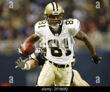 St. Louis Rams Az-Zahir Hakim (81) pulls in a Kurt Warner pass during the  NFC Championship game against the Tampa Bay Buccaneers Sunday, Jan. 23,  2000, in St. Louis, Mo. The Rams and Tennessee Titans meet in Super Bowl  XXXIV Sunday, January