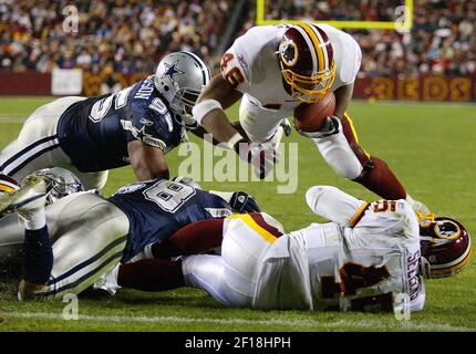 Washington Redskins running back Ladell Betts picks up a first down  reception for 25 yards against the St. Louis Rams in the fourth quarter at  FedEx Field in Landover, Maryland, on September