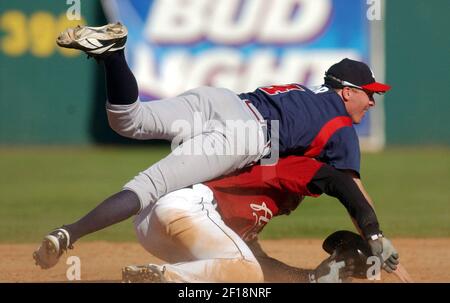 Houston Astros' Charles Gipson goes airborne to dodge a close pitch in the  fifth inning against the Florida Marlins, Thursday, Sept. 15, 2005, in  Houston. The Astros won, 4-1. (AP Photo/Pat Sullivan