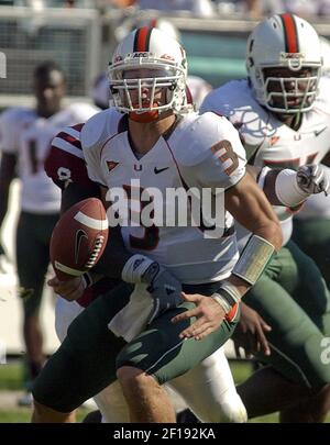 University of Miami quarterback Kyle Wright (3) throws to wide receiver  Darnell Jenkins (8) during the first half against Oklahoma. Oklahoma  defeated Miami, 51-13, at Gaylord Family-Oklahoma Memorial Stadium in  Norman, Oklahoma