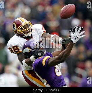 20 November 2005: Redskins safety Sean Taylor (21) breaks up a pass  intended for Oakland WR Randy Moss (18). The Oakland Raiders defeated the  Washington Redskins 16-13 at FedEx Field in Landover