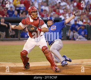 St. Louis Cardinals catcher Mike Matheny, left, and starting pitcher Chris  Carpenter (29) confer on the mound in the fourth inning against the Arizona  Diamondbacks, Saturday, Sept. 18, 2004, in St. Louis.