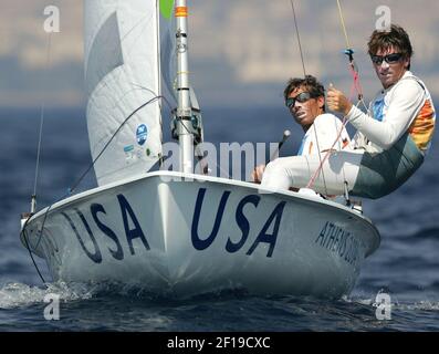 KRT SPORTS STORY SLUGGED: OLY-SAILING KRT PHOTO BY AL DIAZ/MIAMI HERALD (SOUTH FLORIDA SUN-SENTINEL OUT) (August 21) ATHENS, GREECE -- Kevin Burhnham, front, and Paul Foerster of the United States win the gold medal in the men's 470 Class Sailboat at the 2004 Olympic Games on Saturday, August 21, 2004. (Photo by gsb) 2004
