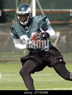 Philadelphia Eagles wide receiver Terrell Owens sits on the bench during  the first half against the Washington Redskins Sunday, Nov. 21, 2004, in  Philadelphia. Owens, the Eagles' premier receiver, didn't have any