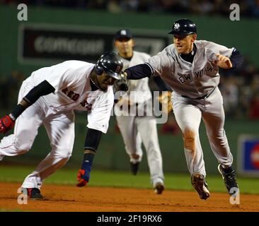 Boston Red Sox catcher Jason Varitek jumps into the arms of pitcher Keith  Foulke after the final out of game four of the World Series beating the St.  Louis Cardinals 3-0 at