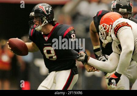 HOUP2002090801 - Houston, Sept. 8, (UPI) -- Houston Texans quarterback  David Carr (8) tries to escape the Dallas Cowboys defense during the 2nd  quarter on Sept. 8, 2002, in Houston. The Texans