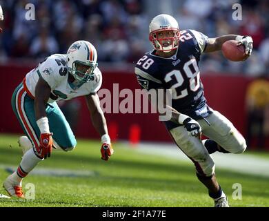 FOXBORO, MA - OCTOBER 24: Patriots #37 Rodney Harrison cheers after  breaking up a pass to Wayne Chrebet late in the fourth quarter with 8 yds  to go to pull ahead during