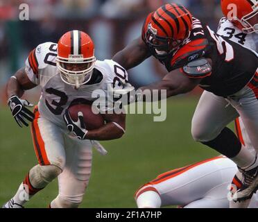 KRT SPORTS STORY SLUGGED: BENGALS-BROWNS KRT PHOTO BY BOD DEMAY/AKRON  BEACON JOURNAL (September 15) CLEVELAND, OH -- Cleveland receiver Andre  Davis, right, bats the ball away from Cincinnati defender Artrell Hawkins,  left