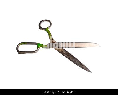 Old iron scissors tailor hand tools for sewing clothes. Iron large scissors. Hand tools. Cutting and sewing clothes. Repair and sewing of clothes. Whi Stock Photo