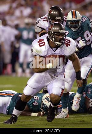 FILE ** Tampa Bay Buccaneers' Mike Alstott reacts to dropping pass during  the fourth quarter of Tampa Bay's NFL football game against the Seattle  Seahawks in this Dec. 31, 2006 file