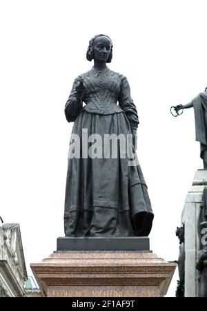 Statue of Florence Nightingale, part of the Guards Crimean War Memorial, at Waterloo Place, St James's, London. Picture date: Thursday March 4, 2021. Stock Photo