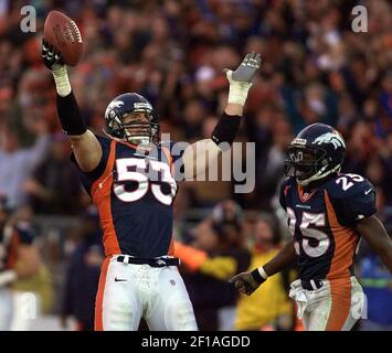 Denver Broncos' Bill Romanowski celebrates after sacking Falcon's