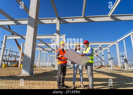 Construction Business Team at Construction Site. Business, Building, Teamwork and People Concept. Stock Photo