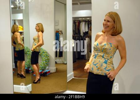 Sally Knight tries on a classic look at Sloan boutique in Dilworth