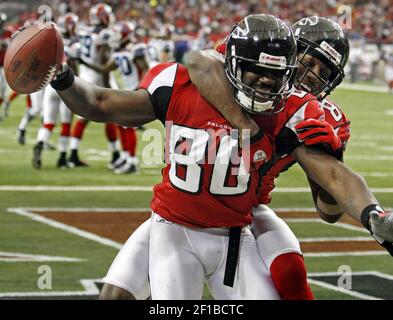 Atlanta Falcons wide receiver Marty Booker (80) reacts after scoring a  touchdown defended by Buffalo Bills cornerback Reggie Corner (27) during  the second half of an NFL football game, Sunday, Dec. 27