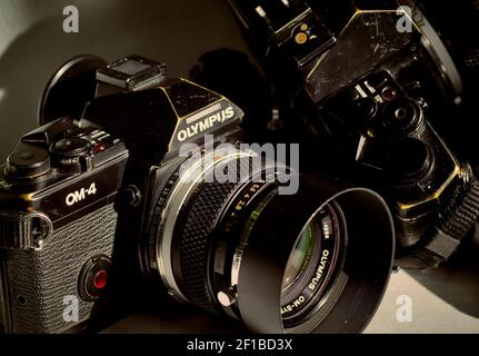 Two Olympus 35 mm film single lens reflex cameras Stock Photo