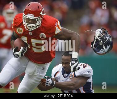 Denver Broncos safety Brian Dawkins stretches before taking part