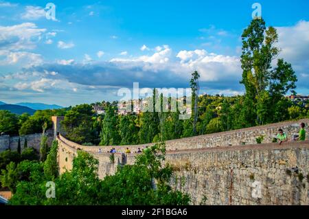 Girona, Spain - July 28, 2019: Scenic view of the historical fortification walls of the city of Girona in Catalonia, Spain Stock Photo