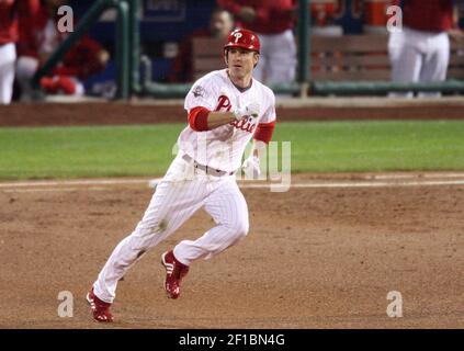 Philadelphia Phillies' Chase Utley heads to the plate past Florida