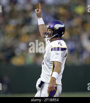 Minnesota Vikings Randy Moss stands in the huddle with Brett Favre in week  5 of the NFL season against the New York Jets at New Meadowlands Stadium in  East Rutherford, New Jersey