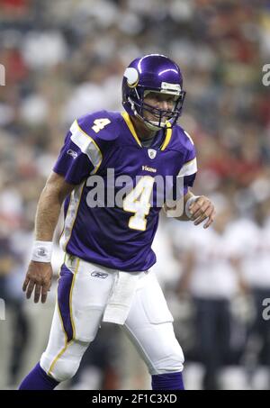 Minnesota Vikings quarterback Brett Favre looks to throw the ball downfield  against the Houston Texans in the first half of an NFL preseason game at  Reliant Stadium in Houston, Texas on August