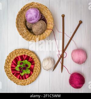 Balls of yarn on a wooden board Stock Photo