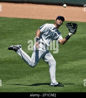 Seattle Mariners center fielder Mike Cameron leaps at the wall to catch a  ball hit by Toronto Blue Jays' Mike Bordick in the second inning Wednesday,  Aug. 13, 2003, in Seattle. (AP