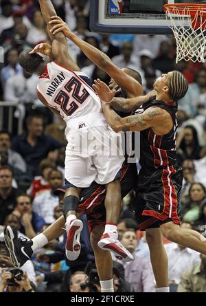 Miami Heat rookie forward Michael Beasley follows through after a shot  during an NBA preseason game against the New Jersey Nets in Paris on  October 9, 2008. The Nets won the contest