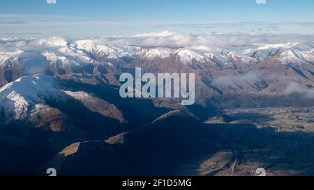 Mountains with snow caps, Aerial shot of Southern Alp made in Queenstown, New Zealand Stock Photo