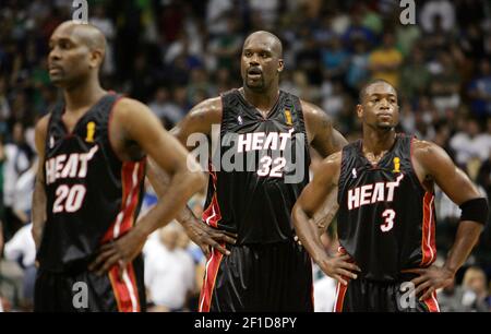 Miami Heat players Gary Payton (left), Shaquille O'Neal and