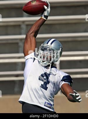 Dallas Cowboys wide receiver Roy E. Williams (11) signals first