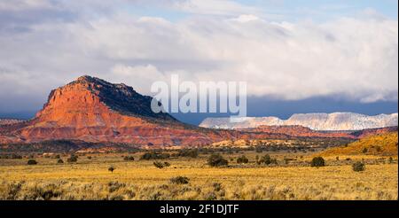 Storm Brewing Sun Hits Red Rock Walls Grand Staircase-Escalante National Monument Stock Photo