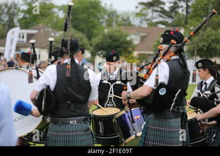 Girvan, South Ayrshire, Scotland, UK , 03 June 2018. Lowland Games. A public event featuring pipe band, a hill race, charity stalls, a gala king & queen, higlhand dancing and strong men competiton. Troon Blackrock Pipe Band perform in the show ring Stock Photo