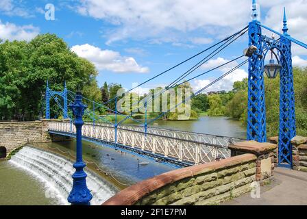 Mill Weir and Suspension Bridge, Jephson Gardens, Royal Leamington Spa, Warwickshire, England, United Kingdom Stock Photo