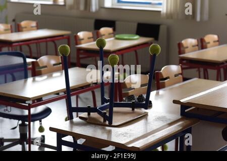 Empty children classroom with chairs and tables Stock Photo