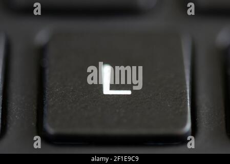 L key on a laptop keyboard Stock Photo