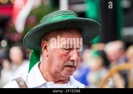 Cheese vendors in traditional costume at Alkmaar Cheese Market, Netherlands Stock Photo