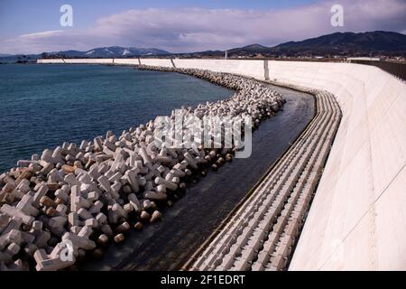 Photo shows one of the steep seawalls in Kesennuma,  Miyagi Prefecture, Japan on 19 Feb. 2021. March 11, 2021 marks the 10th anniversary of the earthquake and tsunami that devastated the entire region taking more than 18,000 lives and wiping out hundreds of thousands of homes and businesses. Photographer: Robert Gilhooly Stock Photo