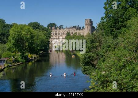 Warwick Castle & River Avon,Warwick Warwickshire,England.Warwick Castle is a medieval castle developed from an original built by William the Conqueror Stock Photo