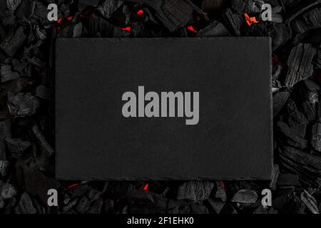 Black slate charcoal board. Blank for a poster, banner or postcard. Textured background. Stock Photo