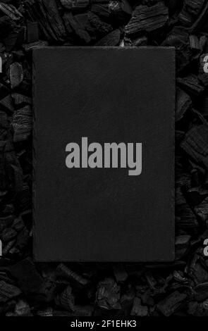 Black slate charcoal board. Blank for a poster, banner or postcard. Textured background. Stock Photo