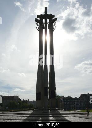 Monument to the fallen shipyard workers in Gdańsk in Poland in backlight Stock Photo