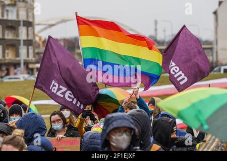 Gdansk, Poland 7th, March 2021 Protesters with feminist , pro-choice banners and LGBT movement rainbow flags are seen in Gdansk, Poland on 7 March 2021 The Manifa is annual feminist and woman rights rally to celebrate International Women's Day - a global day celebrating the social, economic, cultural and political achievements of women. Protesters demand woman rights, respect, and free choice of abortion. Credit: Vadim Pacajev/Alamy Live News Stock Photo