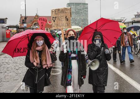 Gdansk, Poland 7th, March 2021 Protesters with feminist , pro-choice banners and LGBT movement rainbow flags are seen in Gdansk, Poland on 7 March 2021 The Manifa is annual feminist and woman rights rally to celebrate International Women's Day - a global day celebrating the social, economic, cultural and political achievements of women. Protesters demand woman rights, respect, and free choice of abortion. Credit: Vadim Pacajev/Alamy Live News Stock Photo