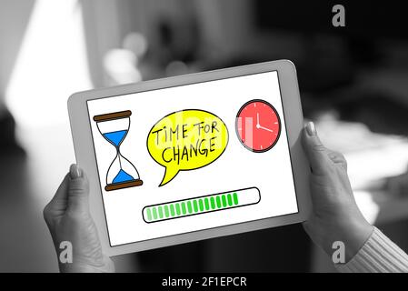 Time for change concept shown on a tablet held by a woman Stock Photo