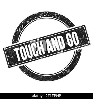 TOUCH AND GO text on black grungy round vintage stamp. Stock Photo