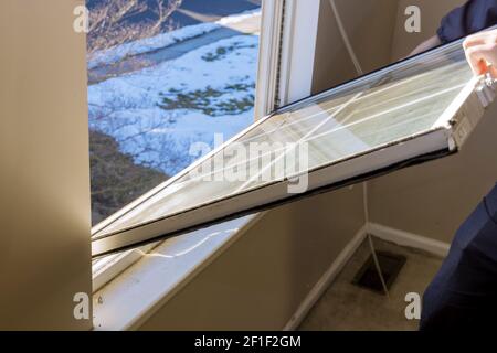 Professional master for removed break window in house during home renovation Stock Photo