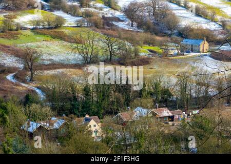 Snow covered landscape with trees at Matlock Bath in the Derbyshire Peak District England UK Stock Photo