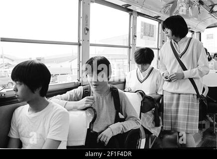 Kids in Japan ride to school on bus in Hiroshima , Japan Stock Photo